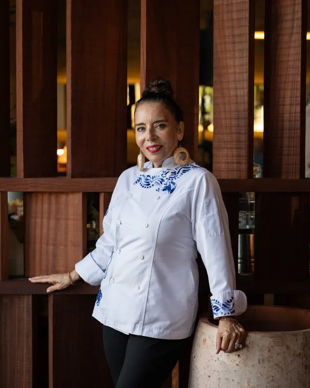 The chef in her embroidered whites at Amado, Burlingame