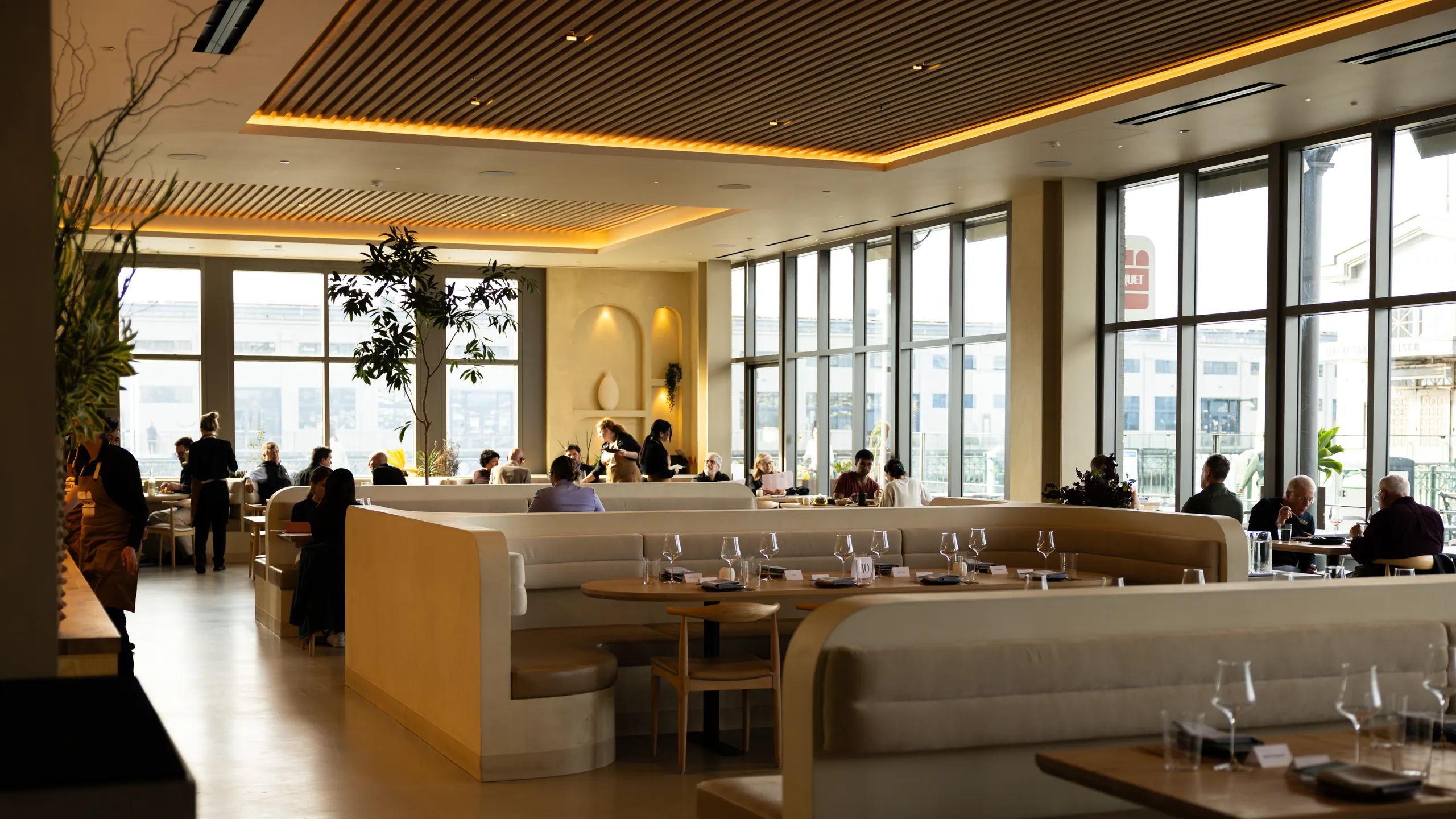 The dining room in daylight at Arquet, San Francisco