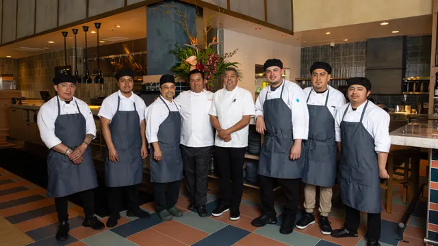 The full kitchen brigade lined up at Casa Sofia, San Francisco