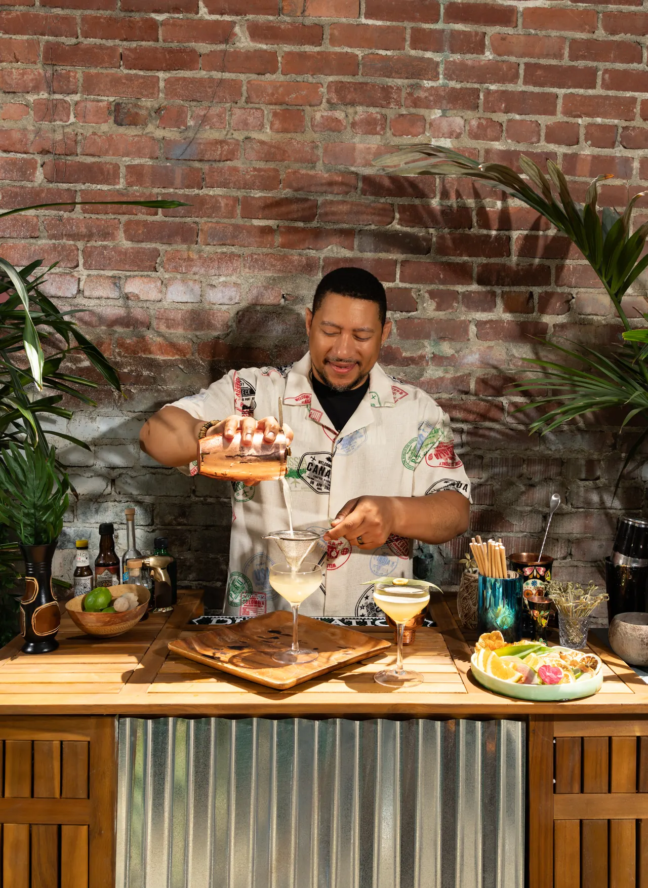 The author garnishing on set, from Caribbean Cocktails for Ten Speed Press