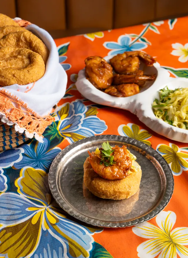 Fritters over the floral tablecloth, from Caribbean Cocktails for Ten Speed Press