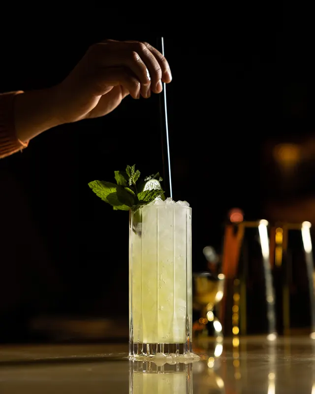 A mint-crowned julep stirred tall at Honeycomb Cocktail Lounge, Livermore