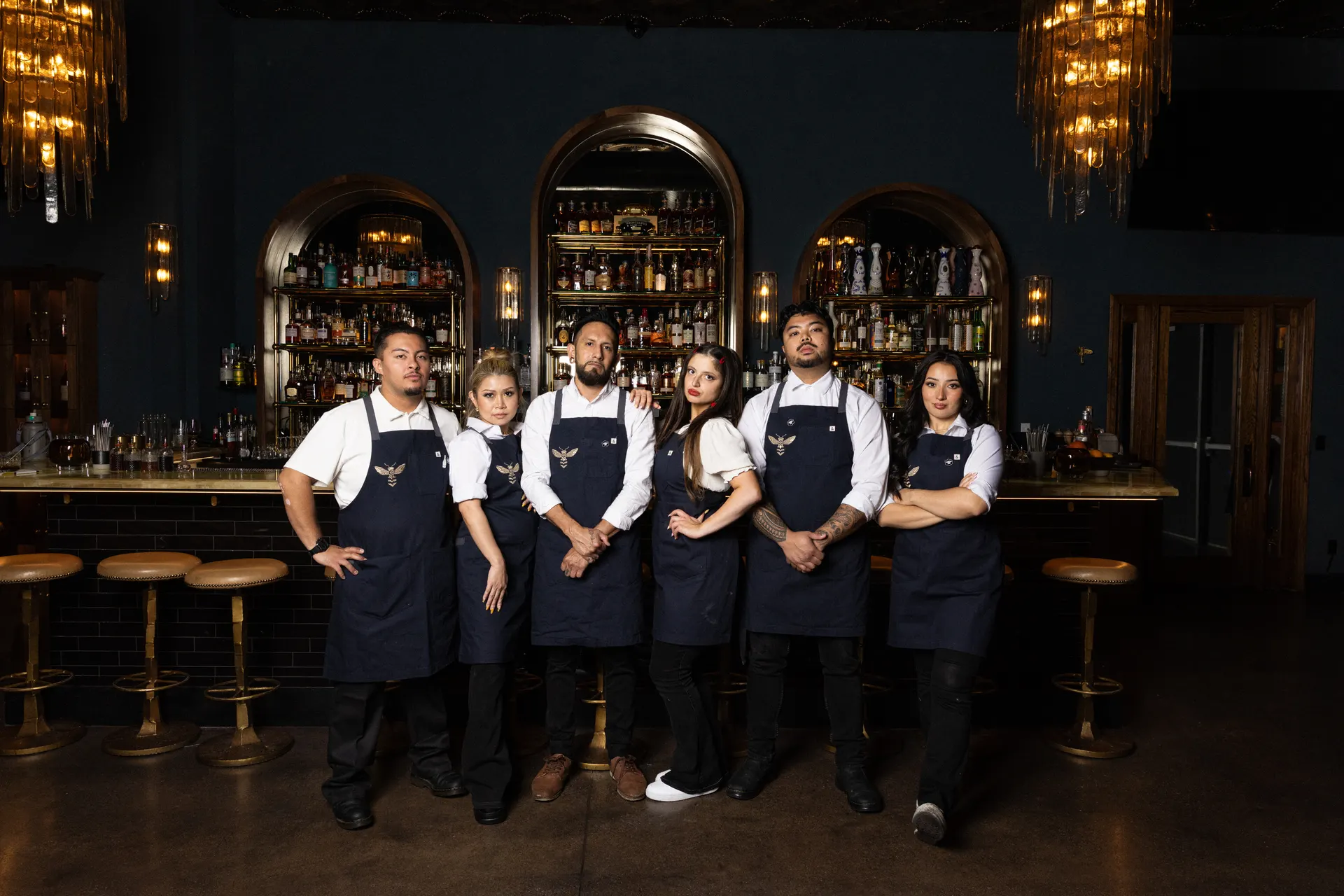 The team beneath the arches and chandeliers at Honeycomb Cocktail Lounge, Livermore