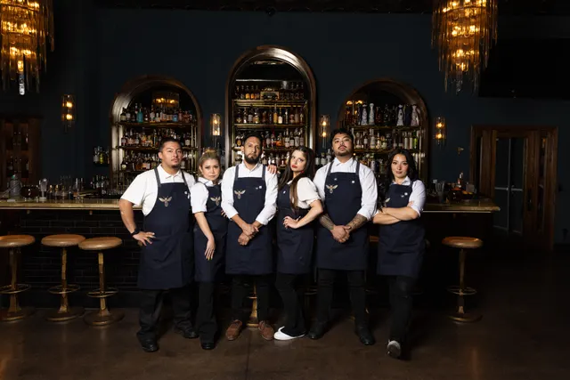 The team beneath the arches and chandeliers at Honeycomb Cocktail Lounge, Livermore