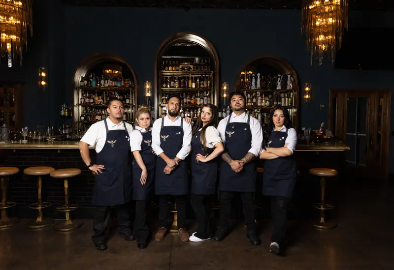 The Honeycomb team beneath the arches, the staff and team portrait portfolio