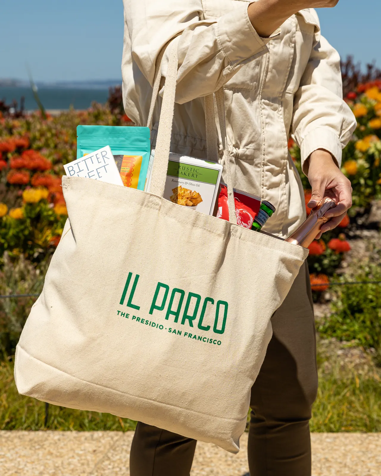 The branded Il Parco tote carried past the flowerbeds at the Presidio, San Francisco