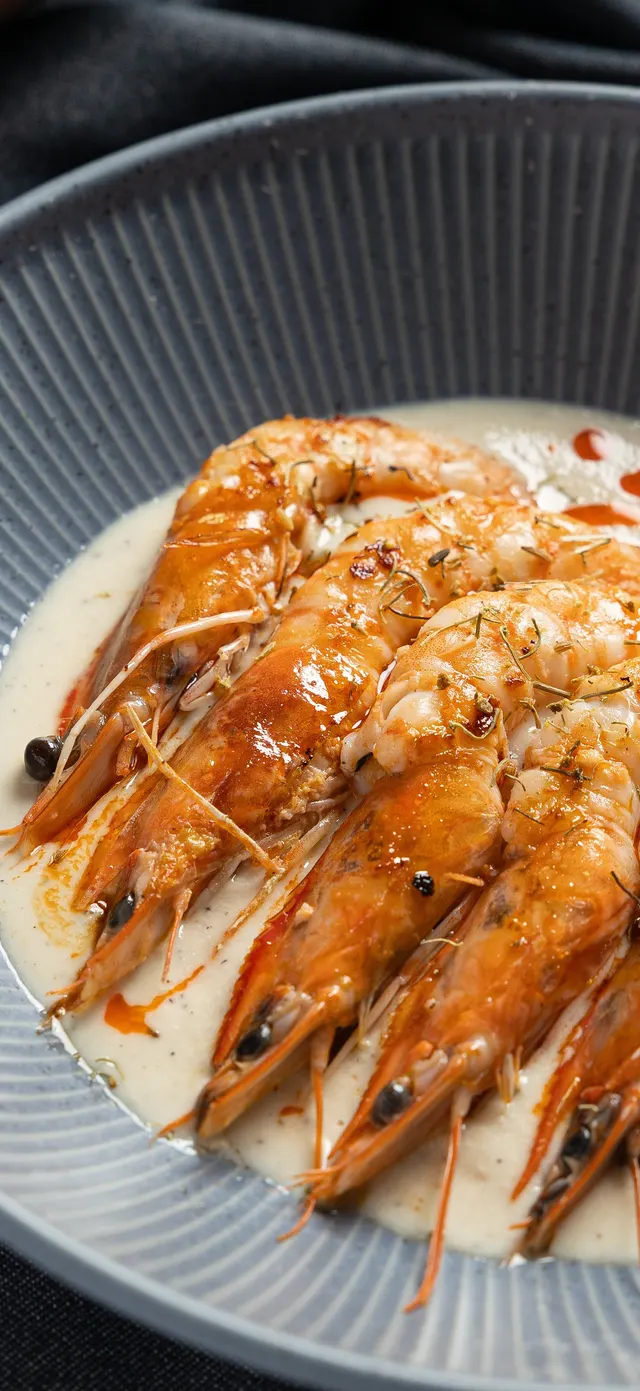 Head-on prawns in a garlic cream sauce, close in the bowl at La Marcha, Berkeley