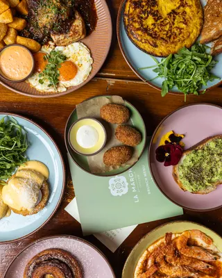 Brunch from above at La Marcha, Berkeley: tortilla, eggs, croquetas and gambas across the table