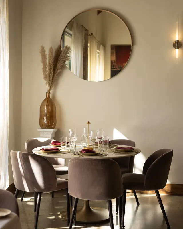 A corner table set for dinner at Milan, San Jose
