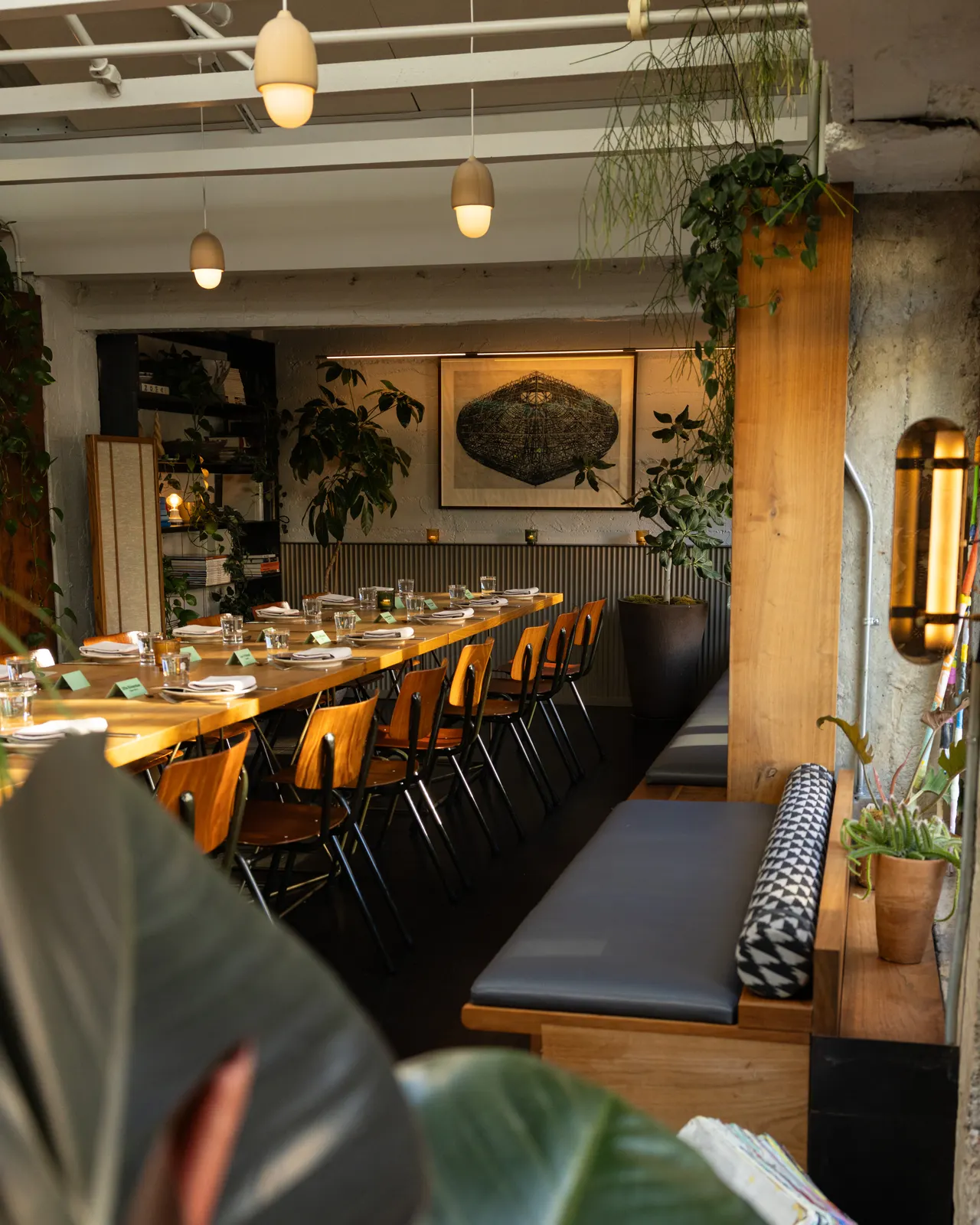 The long table set with wooden chairs at The Progress, San Francisco (shot for the OpenTable Ambassador Summit)