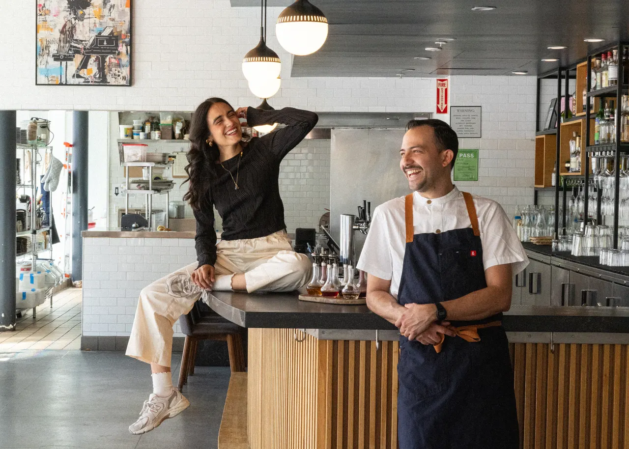 The owners at the counter between services at Pacífico, San Francisco