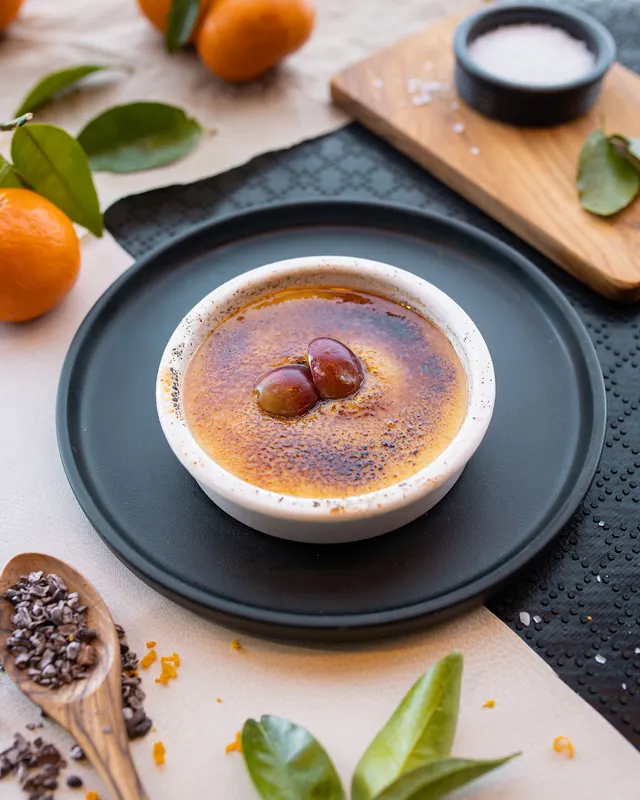 Creme brulee under hard light, recipe-set styling - recipe photography by Lemonad Media