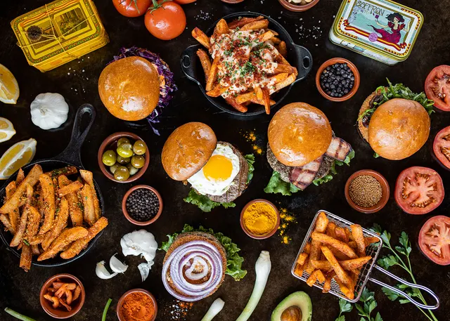 A burger recipe flat-laid with every component in frame - recipe photography by Lemonad Media