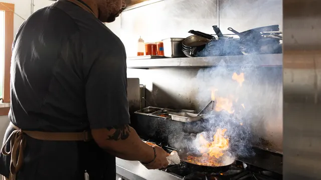Line cooks over open flame at Sobre Mesa, Oakland
